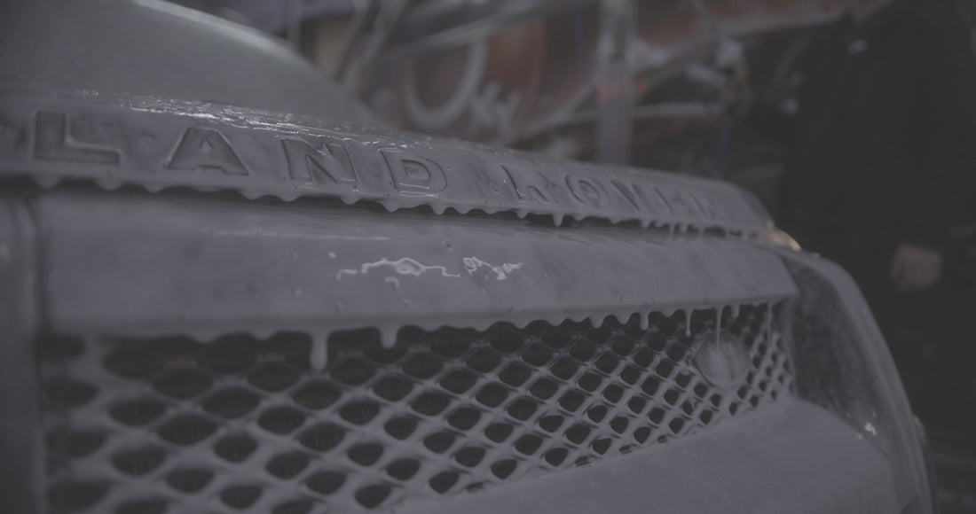 Video is showing Kream Auto's Blush Rush High foam soap enrobing a Land Rover with suds.
